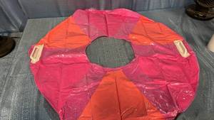 lot 3130 image: Red Orange Pink Inflatable Ring Float Central Hole
