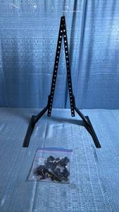 lot 8130 image: TV Stand with Perforated Mounting Brackets and Hardware