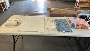 lot 8205 image: Lot of 5 Linen Bundle. Unicorn Hooded Towel, Pillow Case, Kitchen Towels, Outdoor Napkins and Princess Blanket