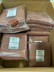 lot 48075 image: Box of 15 Burnt Orange Pillow Covers