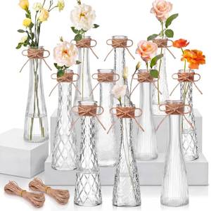 lot 28990 image: Glass Bud Vases for Centerpiece, Set of 12 Tall Clear Flower Vases Bulk, 8.3 Embossed Assorted Glass Vase with Twine for Wedding Party Event Home Table Decor - Retail $36