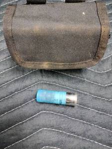 lot 13991 image: black nylon tactical shotgun shell pouch filled with 12-gauge Cartridges - 10Ct.