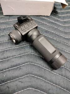 lot 27939 image: tactical vertical foregrip with an integrated LED weapon light