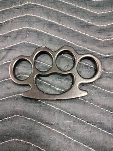 lot 27971 image: Black Metal Knuckle Duster
