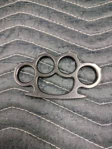 lot 27972 image: Black Metal Knuckle Duster