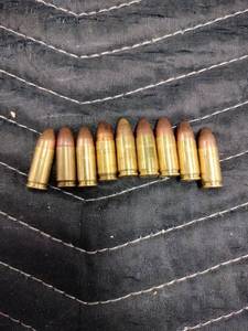 lot 27995 image: 9mm Luger brass cartridge case - 9 Ct.