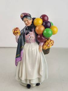 lot 81 image: Royal Doulton Biddy Pennyfarthing HN 1843 Figurine with Balloon Basket