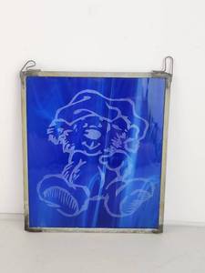 lot 86 image: Blue Stained Glass Panel With Cartoon Etching