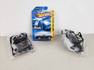 lot 109 image: Hot Wheels Batman 1966 TV Series Batmobile Die-Cast Car with Happy Meal Toys
