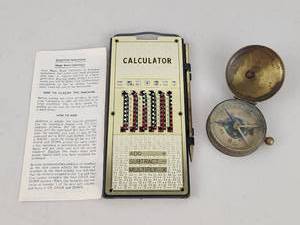 lot 153 image: Vintage Magic Brain Calculator Mechanical Adding Device with Compass