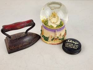 lot 154 image: Vintage Smalls Lot Sad Iron Snow Globe and Drink Cap
