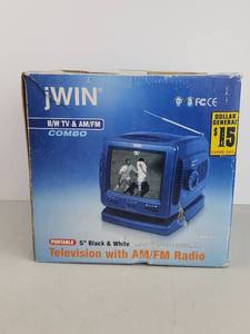 lot 200 image: jWIN JV-TV1010 5 inch Black & White Portable Television with AMFM Radio
