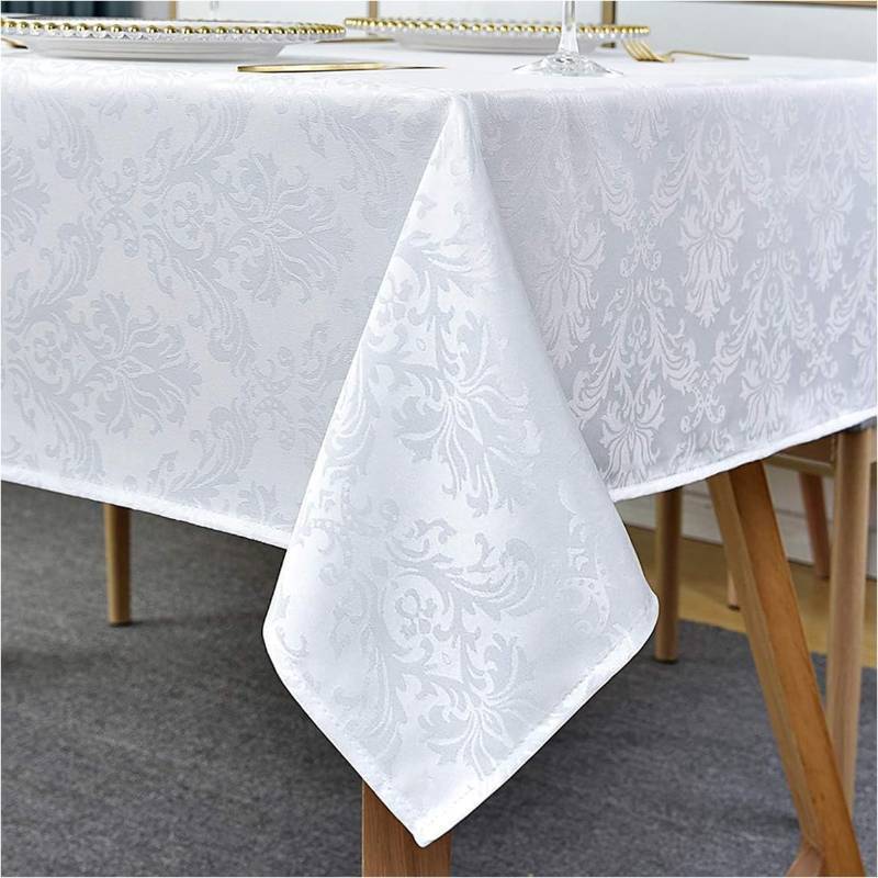 lot 73530 image: White Jacquard Damask Rectangle Tablecloth, 52 x 70 Inch (Red stain) - Retail $16