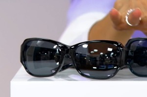 lot 585 image: Foster Grant Solar Shield Chevron Shine Fitsover Sunglasses, Black