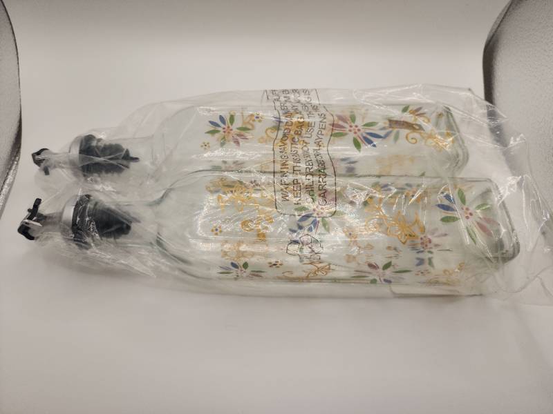 lot 67690 image: Decorative Floral Ceramic Dish Oil Pour Bottles. Set of 2.