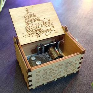 lot 69058 image: Zesta Wooden Hand Cranked Collectable Engraved Music Box (Happy Birthday)