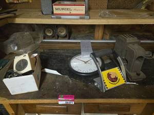 lot 6571 image: Contents of Table Including Craftsman 6 Bench Grinder Ball Bearings, Radio, and More