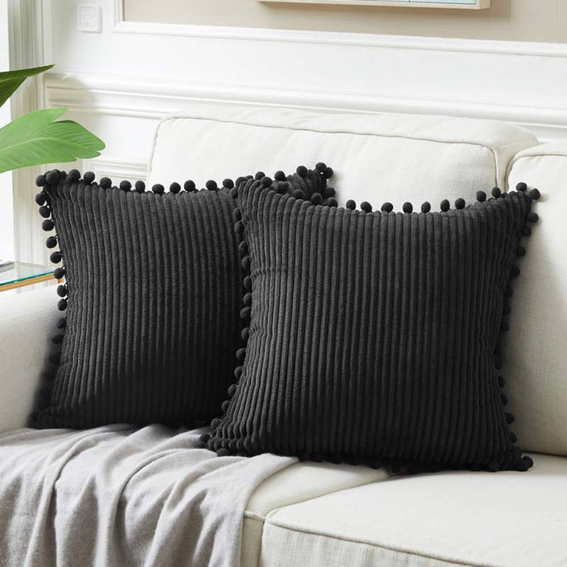 lot 1019 image: Fancy Homi Pack of 2 Black Decorative Throw Pillow Covers with Pom-poms, Soft Corduroy Solid Square Cushion Cases Set for Couch Sofa Bedroom Car Living Room (18x18 Inch45x45 cm, Black) Retail $16.49