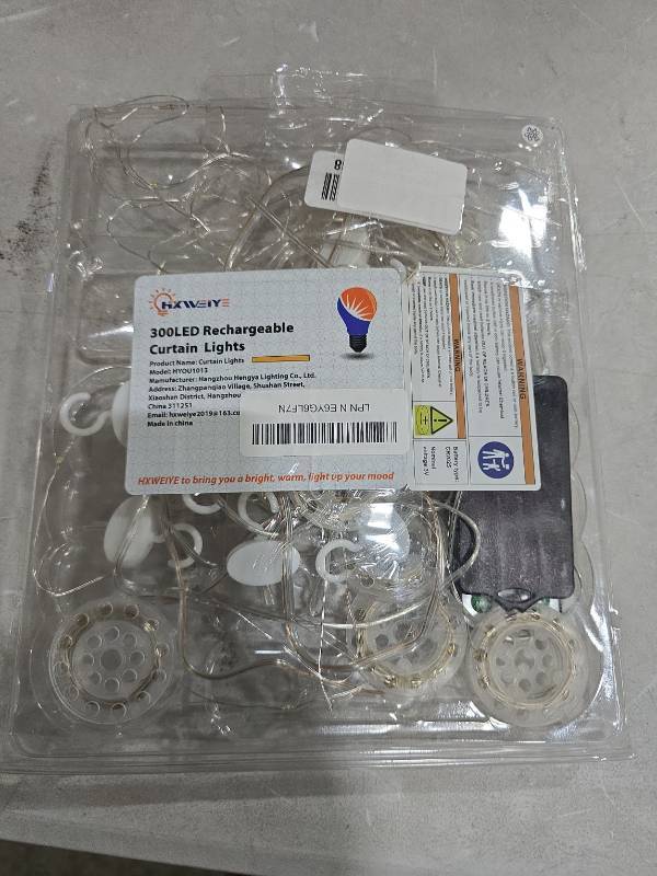 lot 6697 image: 300 LED Rechargeable Curtain Lights