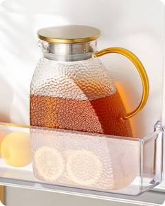 lot 1027 image: Baffect Water Pitcher Glass Jug With Lid and Spout (Hammer Pattern)