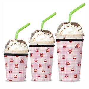 lot 20456 image: 3 Pack Reusable Insulated Neoprene Iced Coffee Cup Sleeve, Durable Drink Sleeve for Cold Beverages & Hot Drinks, Beverage Holder for Iced Coffee & Cold Soda and More (Pink Cherry&Bow)