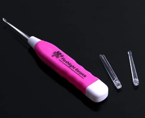 lot 8351 image: Flosslight Cordless Hair Comb Flossbrush with Replaceable Heads - Stock image may not match actual product image