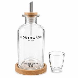 lot 12422 image: Aeakey Glass Mouthwash Dispenser Set (Cup missing)