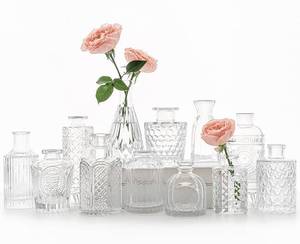 lot 13305 image: SUPMIND 12pcs Glass Bud Vase Set, Clear Small Flower Vases for Centerpieces