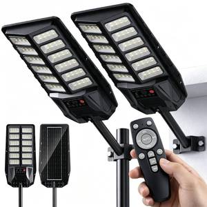 lot 19888 image: HWTDJJY Solar Street Light for Outdoor 2 Pack, 550W Multi-Mode Solar Street Light with Motion Sensor, 6500K IP67 Waterproof Dusk to Dawn Outdoor Light for Courtyard Path (Used)