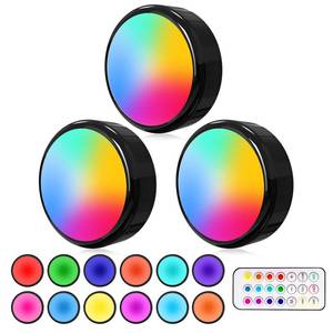 lot 2480 image: ILYXY LED Puck Lights with Remote, 6 Pack Under Cabinet Lighting, Battery Operated Push Light, Dimmable & Color Changing Tap Lights, Stick-On, Shiny Black