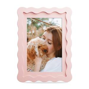 lot 2351 image: THKRLOF 5x7 Picture Frame with Mat for 4x6, Wavy Edge Wooden Real Glass Photo Frame for Tabletop and Wall Hanging, Pink, 1 Pack