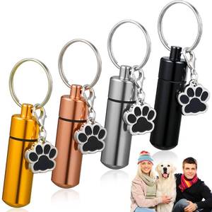 lot 8456 image: Loetere 4 Pcs Pet Urn Keychain with Paw Pendants