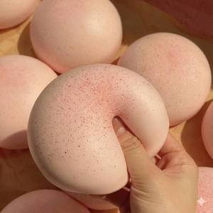 lot 14058 image: Tim Chess Pink Cheese Slow Rising Squishy, Sticky Bread Squishy Stress Ball