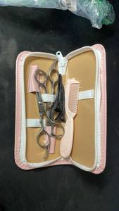 lot 10318 image: Hair Care Grooming Set with Scissors Comb and Case
