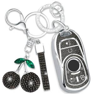 lot 14385 image: Rayslesan Buick Key Fob Cover with Cherry Keychain