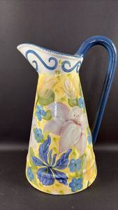 lot 112 image: Large (15.5 Inches at tallest point) Ceramic Pitcher with Blue Handle and Floral Decoration