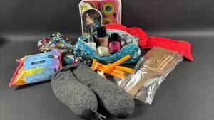lot 213 image: Beauty Bundle Includes Volumizing Rollers and NodPod Weighted Sleep Mask