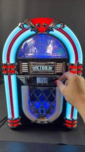 lot 249 image: Victrola Desktop Jukebox with Radio. (CD player Door Broken but the Player Appears Functional)