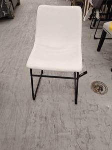 lot 20136 image: White Vinyl Upholstered Dining Chair w Black Metal Frame