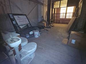 lot 22596 image: Contents of Room - Toilets, Hollow Tubes, Sink, Glass Door