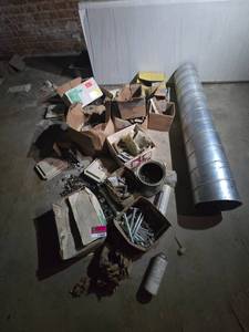 lot 23642 image: Mixed Hardware Lot with Round Spiral Duct Section and Assorted Fasteners