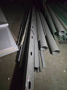 lot 23653 image: Lot of Metal Framing Channels, Spiral Duct Sections, and Large Diameter Pipe Sections