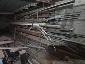 lot 23658 image: Lot of Mixed Metal Pipe Tube and Flat Bar Stock with Storage Rack