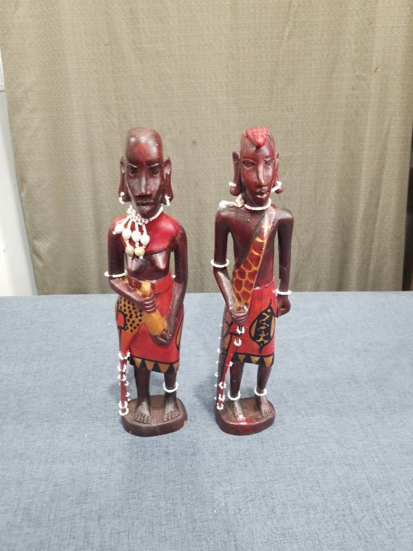 lot 1338 image: Pair of Hand-Carved Wooden Figurines with Beaded Accents