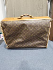 lot 1754 image: LARGE FASHION SUITCASE SOME DAMAGE SEE PICTURES