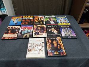 lot 1861 image: 12 DVD Movies Lot Including Beetlejuice Modern Family The Fifth Element