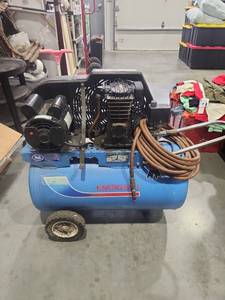 Portable Air Compressor with Hose and Wheels