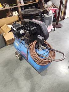 Portable Air Compressor with Hose and Wheels