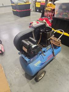 Portable Air Compressor with Hose and Wheels
