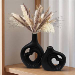 lot 48477 image: Matte Black Heart Shaped Hollow Ceramic Vase Set of 2